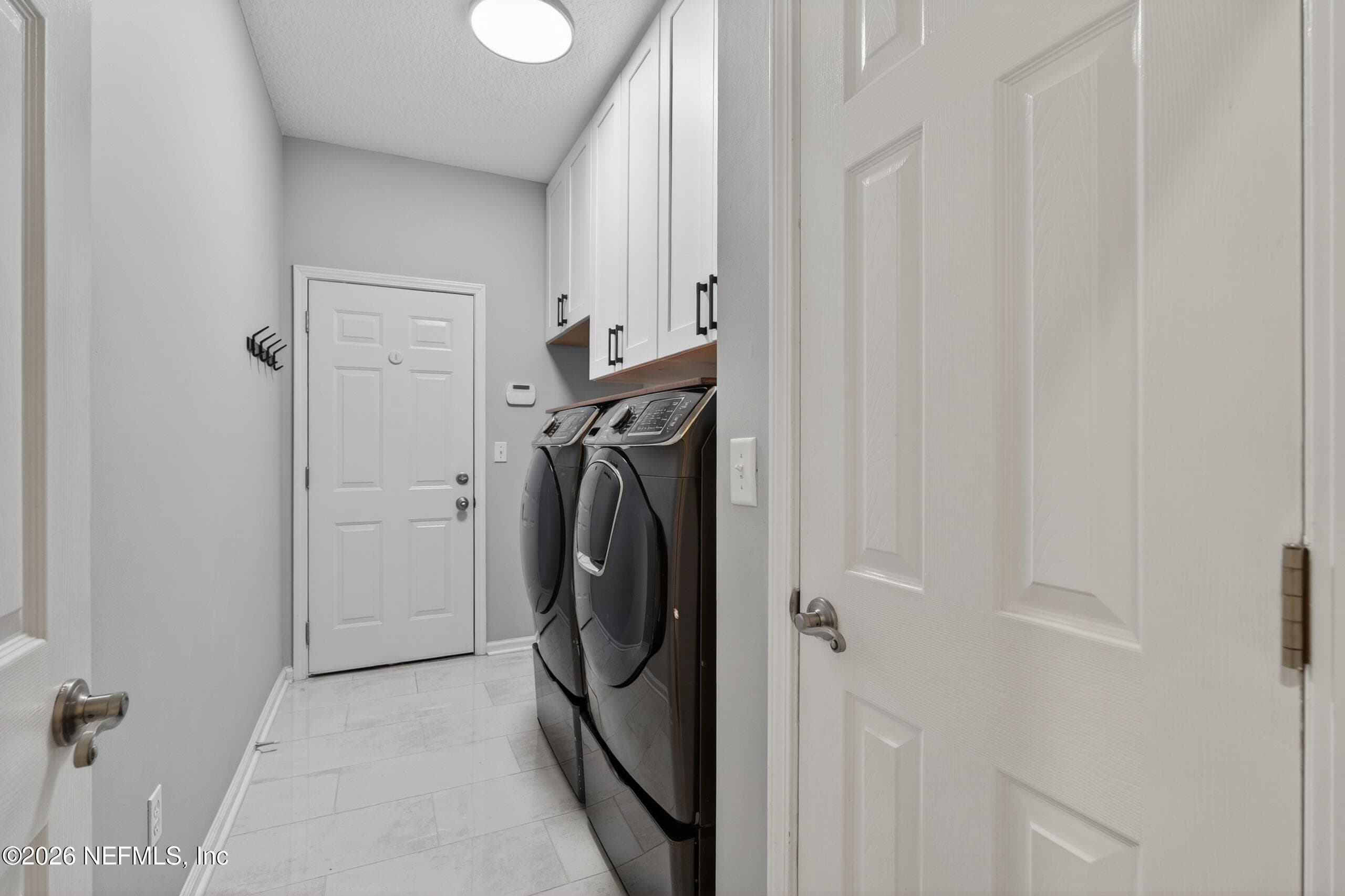 Large Laundry Room with plumbing for sink — 13634 SHIPWATCH Drive, Jacksonville, FL 32225