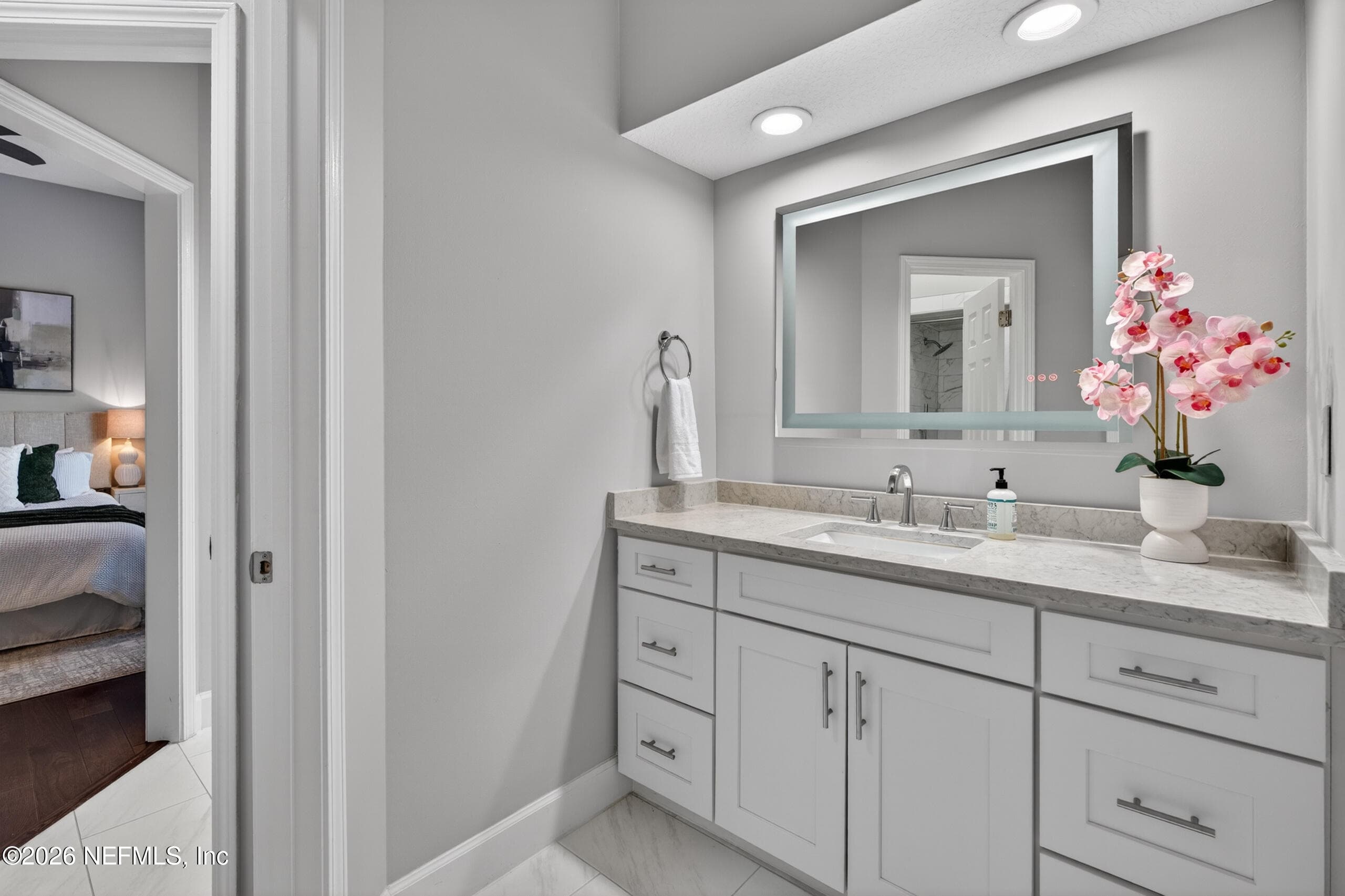 Jack & Jill Bath between 2nd and 3rd bedrooms - Each side has it's own vanity and private door — 13634 SHIPWATCH Drive, Jacksonville, FL 32225