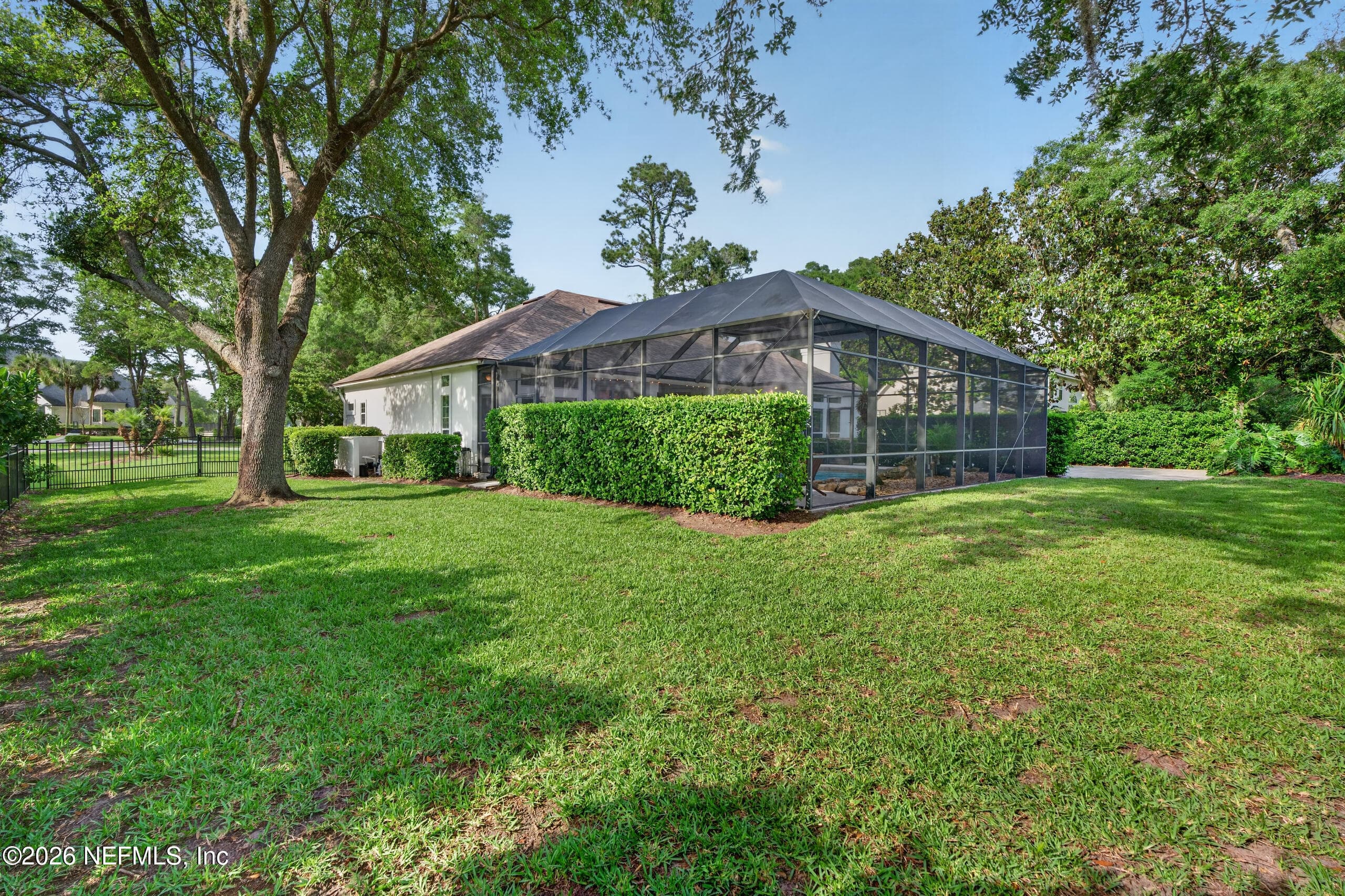 Huge Backyard and side yards beyond the pool enclosure — 13634 SHIPWATCH Drive, Jacksonville, FL 32225