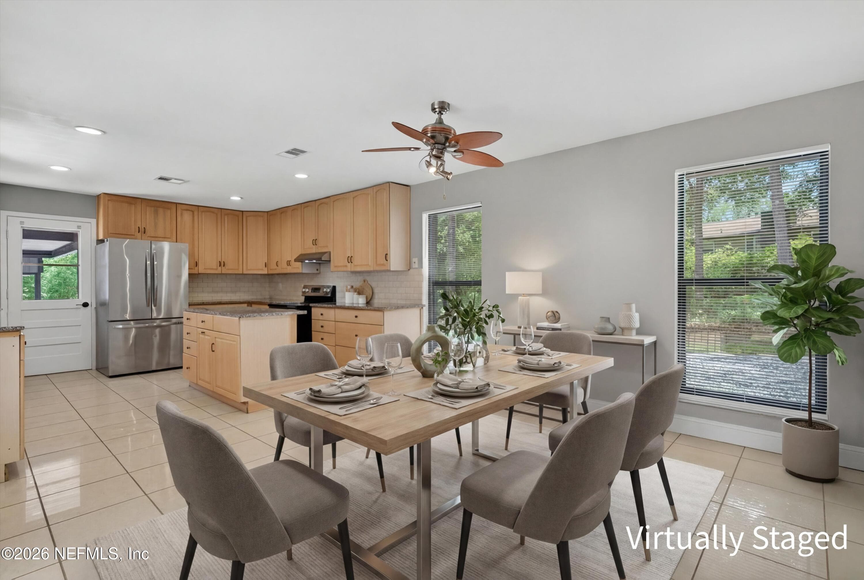 Kitchen, Virtually staged photo. — 2411 HALPERNS Way, Middleburg, FL 32068