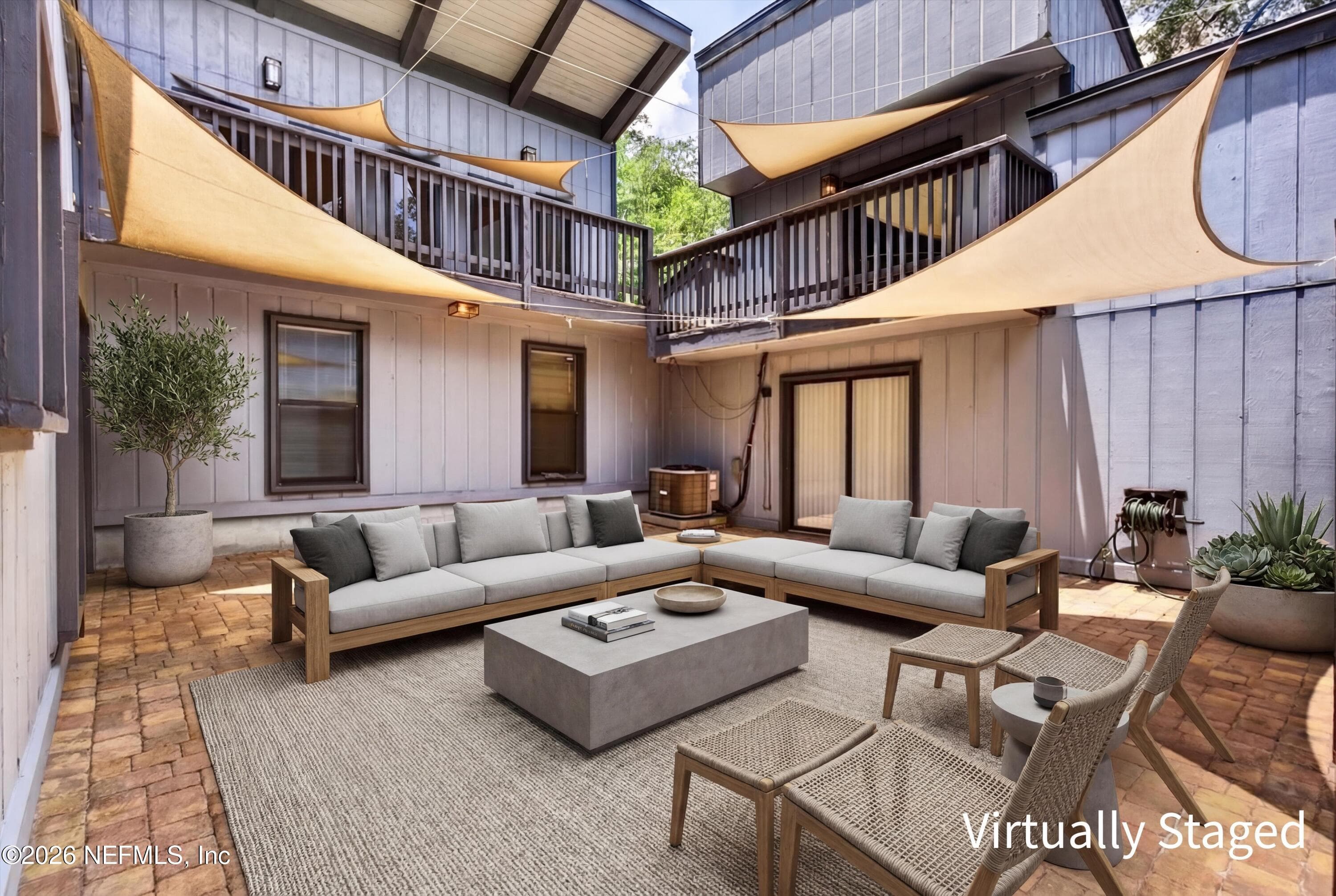 Patio, Virtually staged photo. — 2411 HALPERNS Way, Middleburg, FL 32068