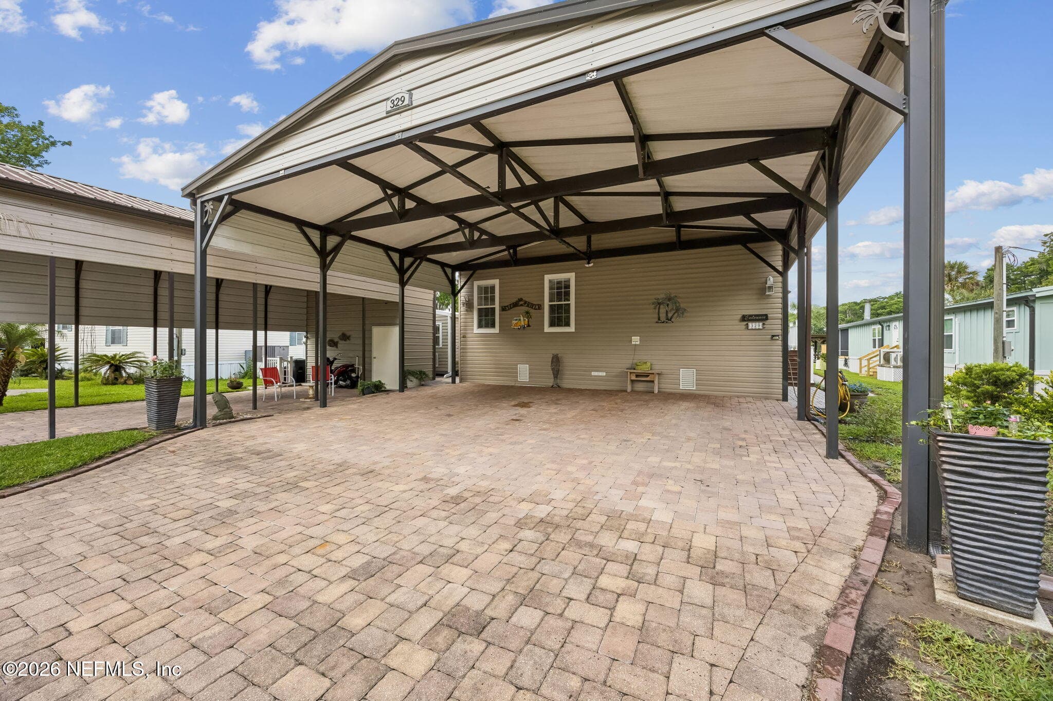Plus Carport Offer Covered Parking For 5 Vehicles — 329 PARADISE Circle, Satsuma, FL 32189