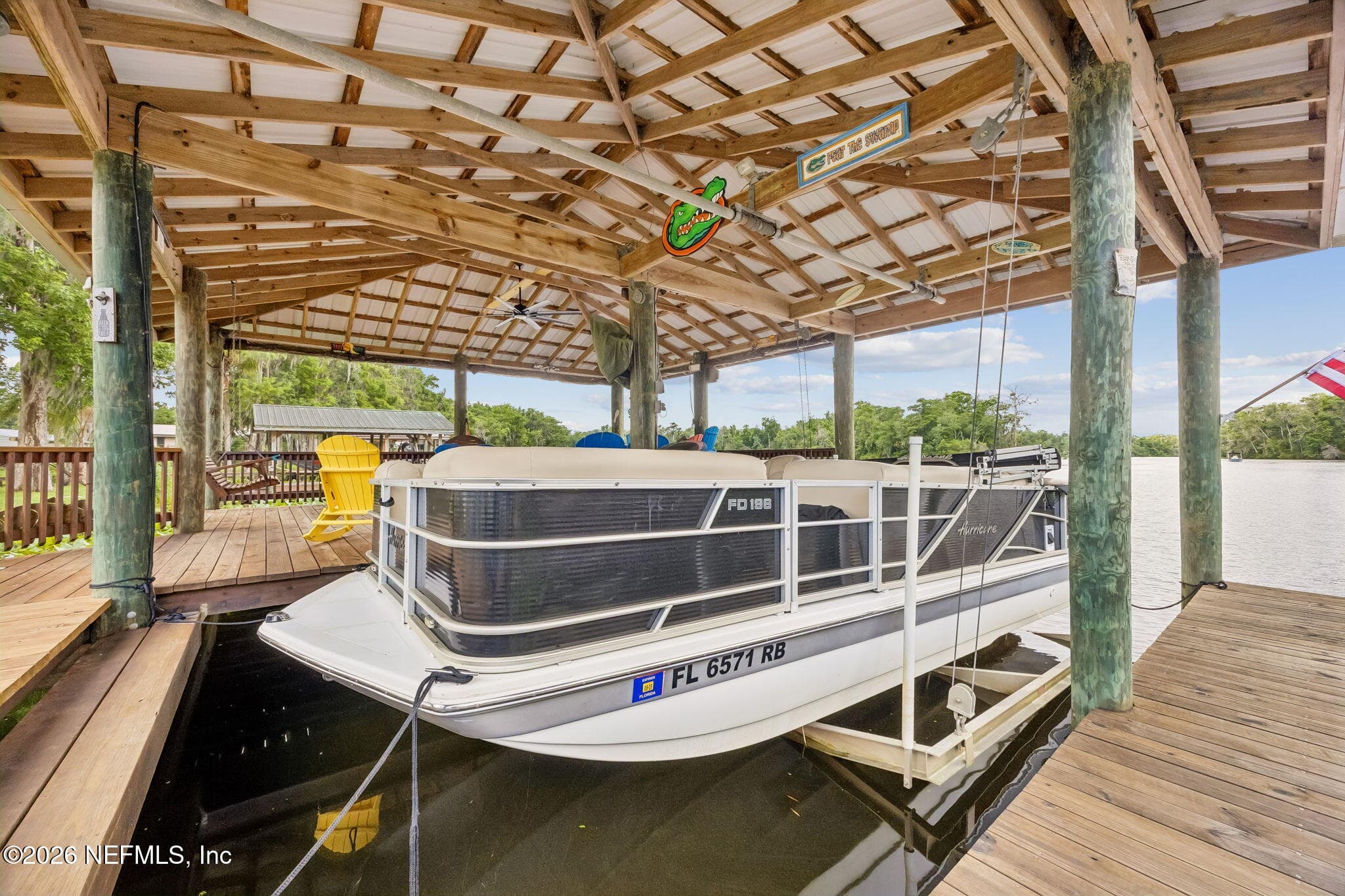The Boat House Will Accommodate A Good Size Pontoon Boat — 329 PARADISE Circle, Satsuma, FL 32189