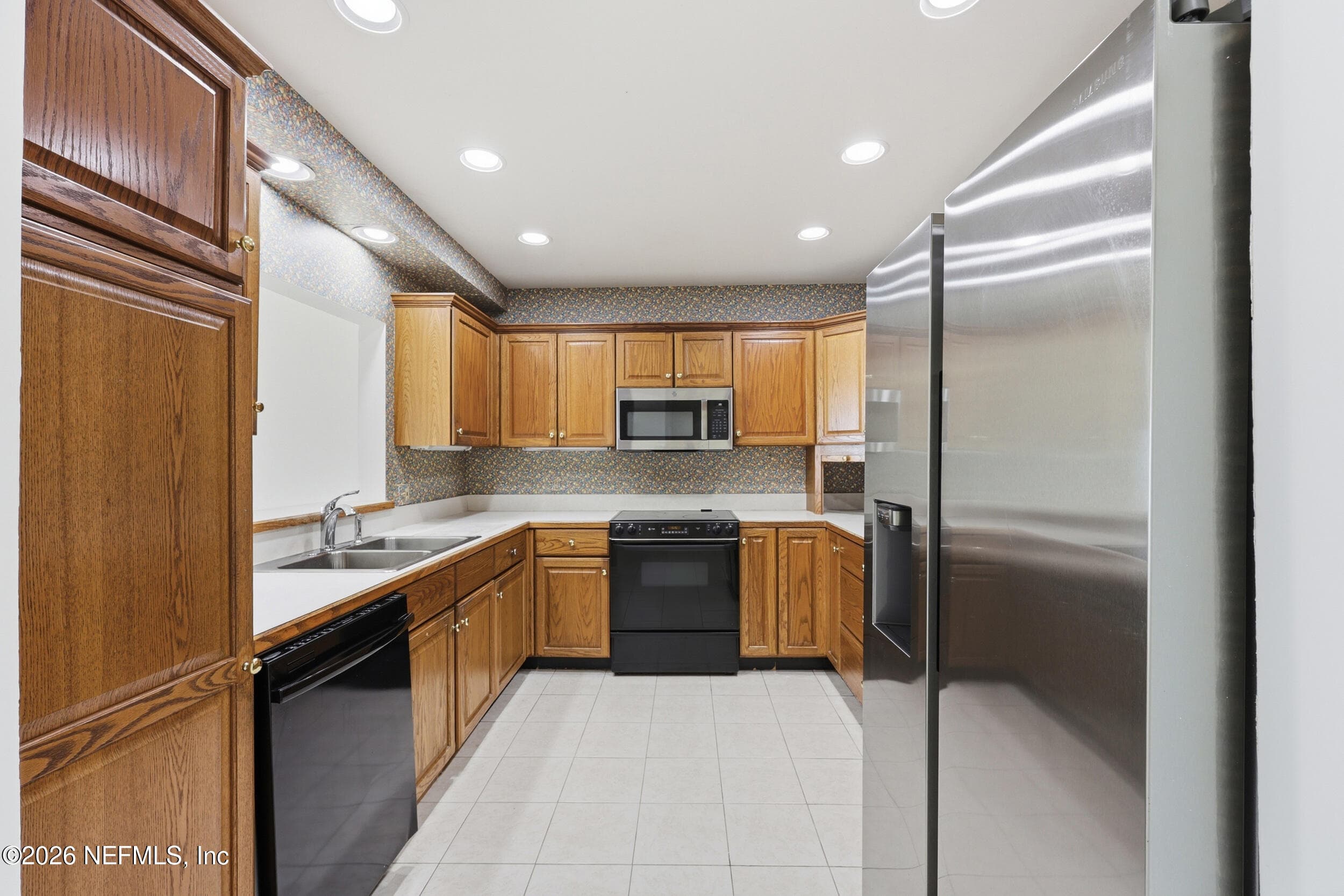 Kitchen with Passthrough Opening — 701 BEACH Avenue 201, Atlantic Beach, FL 32233