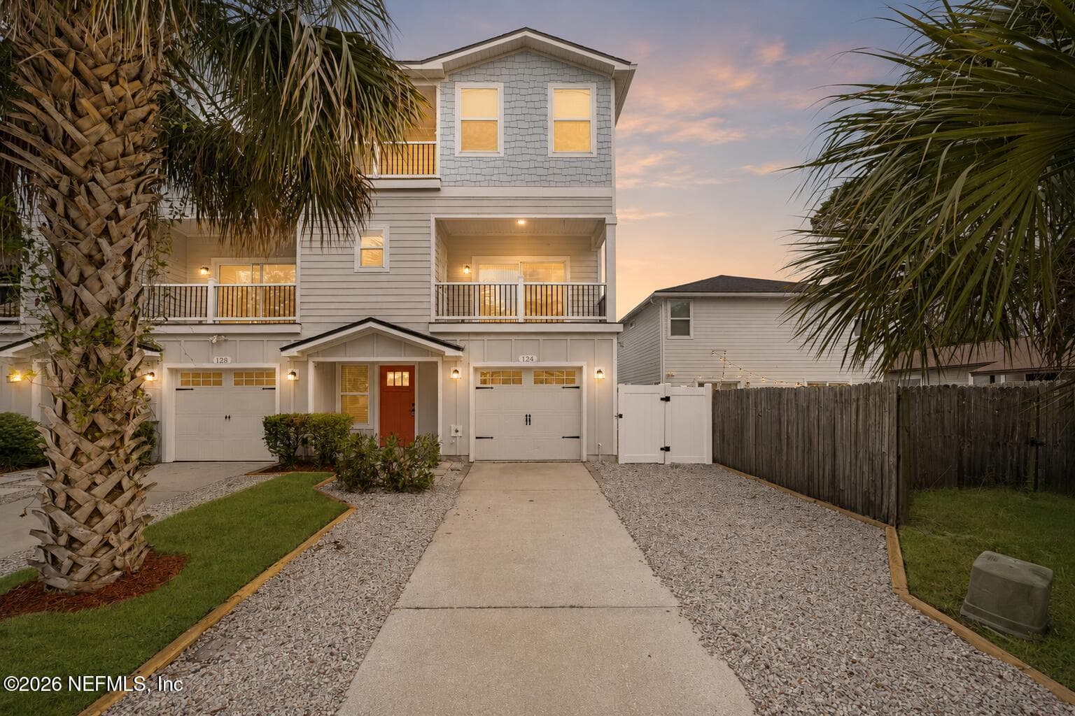 Virtually Enhanced Front - grass light added virtually — 124 S 10TH Street, Jacksonville Beach, FL 32250