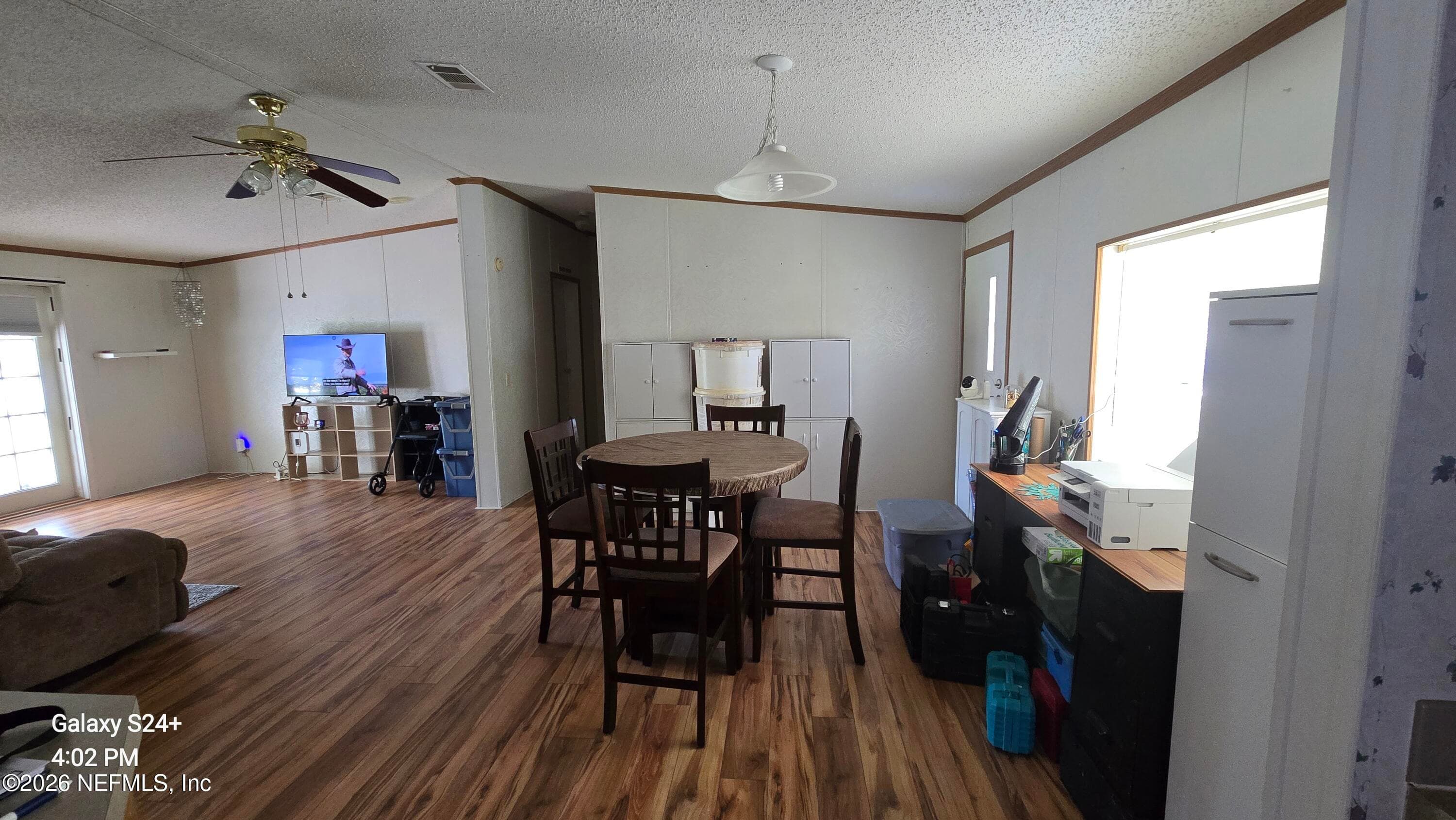 2204 Whippoorwill Dr, St Augustine, FL - View of dining and living areas from kitchen — 2204 WHIPPOORWILL Drive, St. Augustine, FL 32084