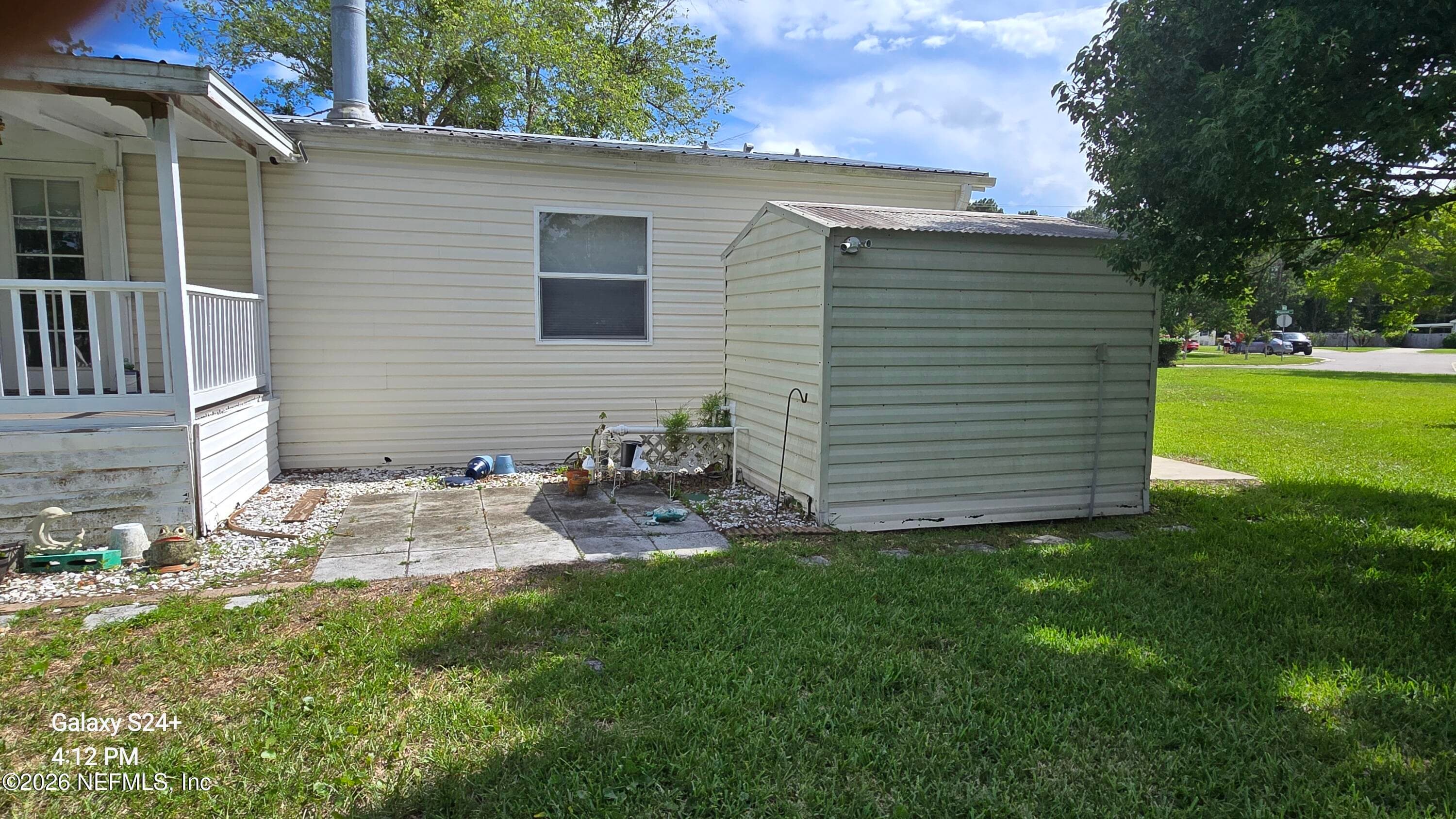2204 Whippoorwill Dr, St Augustine, FL - Back concrete pad/patio — 2204 WHIPPOORWILL Drive, St. Augustine, FL 32084