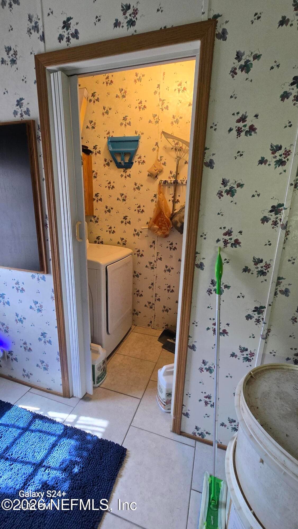2204 Whippoorwill Dr, St Augustine, FL - Utility room off side entrance — 2204 WHIPPOORWILL Drive, St. Augustine, FL 32084