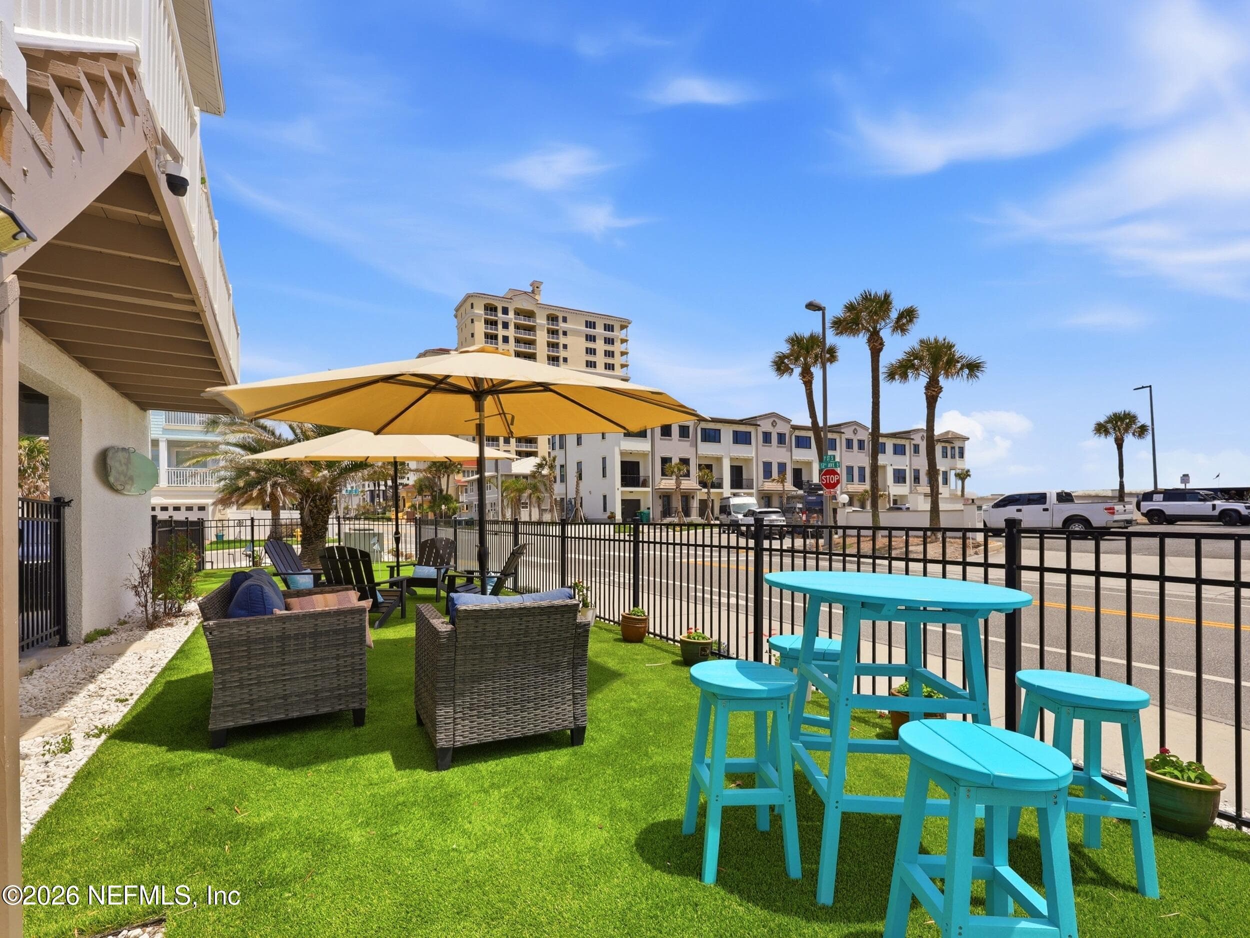 Outdoor living space with putting green — 1202 1ST Street S, Jacksonville Beach, FL 32250