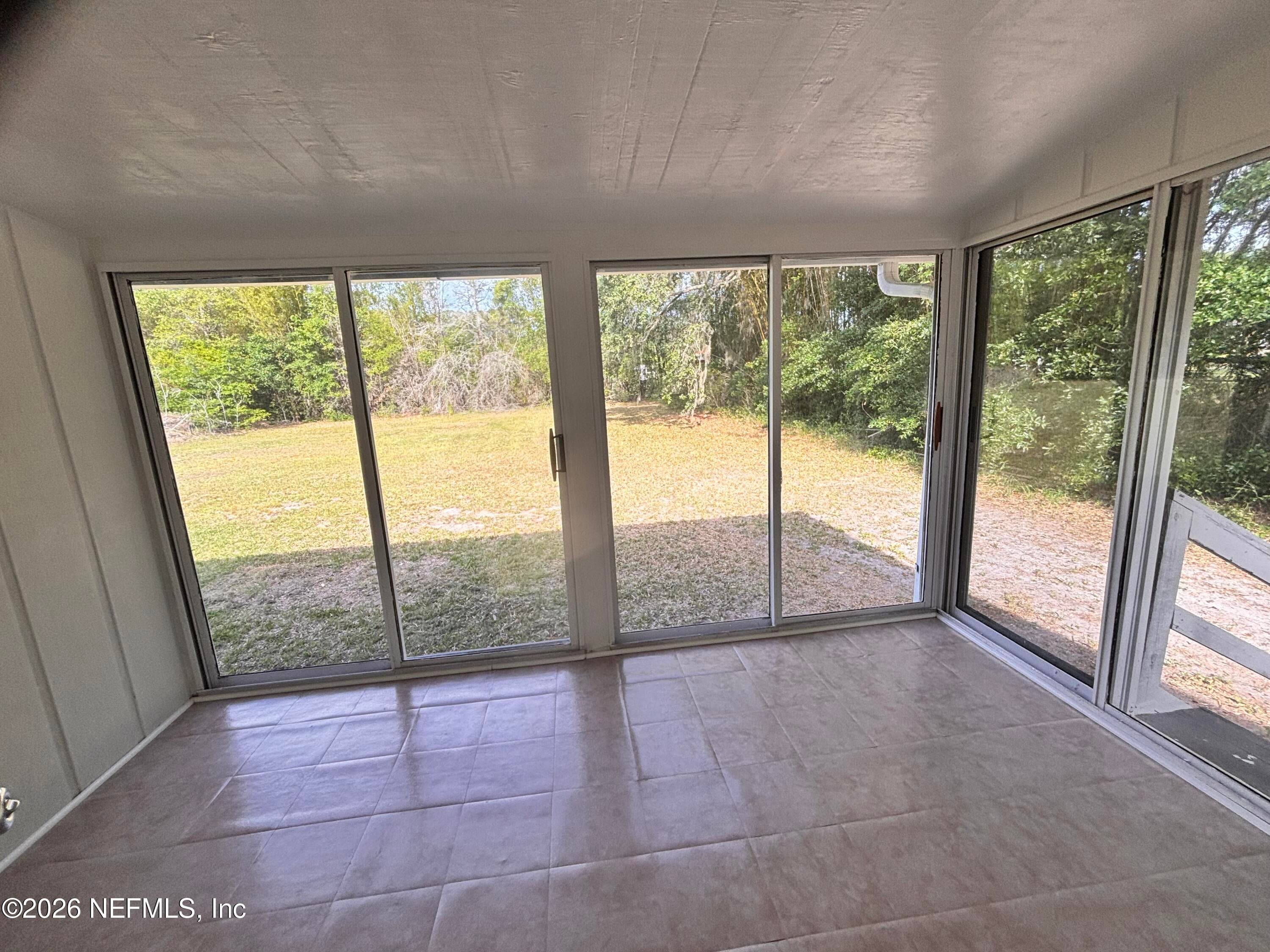 Sunroom connected to master — 941222 OLD NASSAUVILLE Road, Fernandina Beach, FL 32034