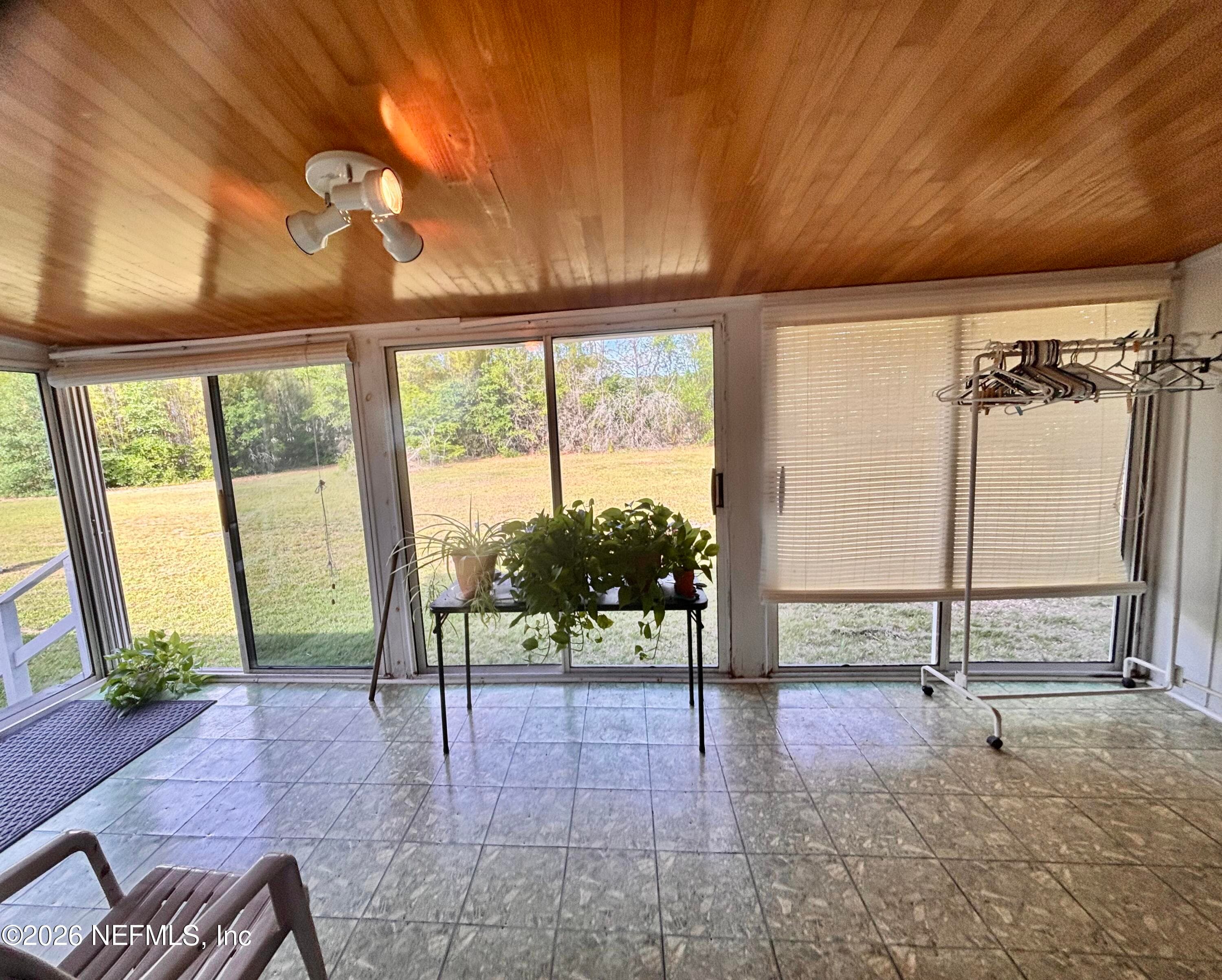 Sunroom off of kitchen — 941222 OLD NASSAUVILLE Road, Fernandina Beach, FL 32034