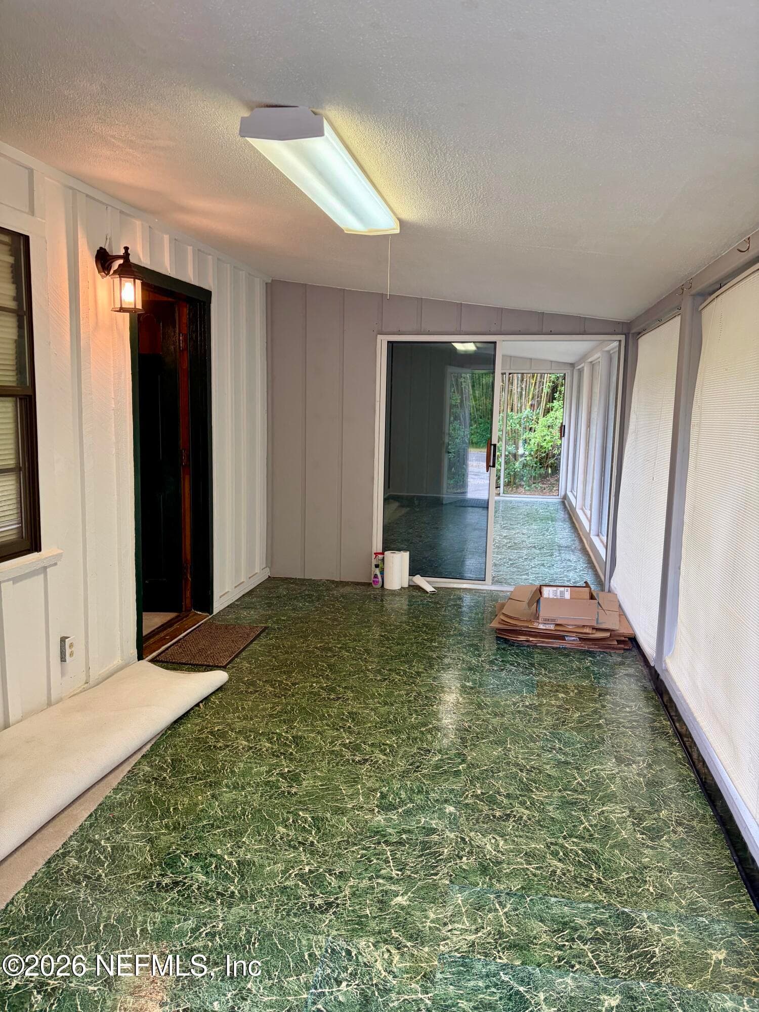 Sunroom on front of house — 941222 OLD NASSAUVILLE Road, Fernandina Beach, FL 32034