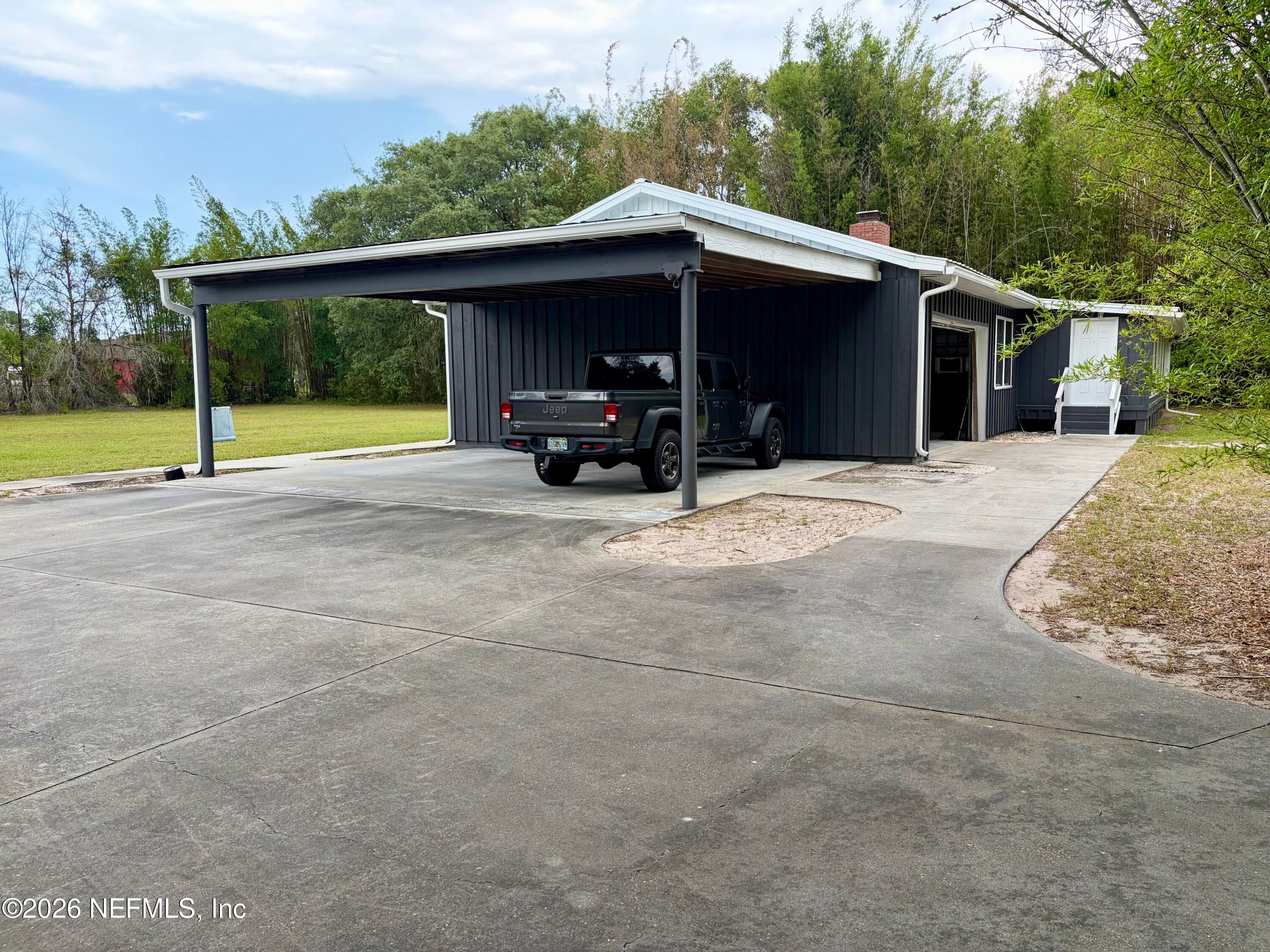 Carport and garage — 941222 OLD NASSAUVILLE Road, Fernandina Beach, FL 32034