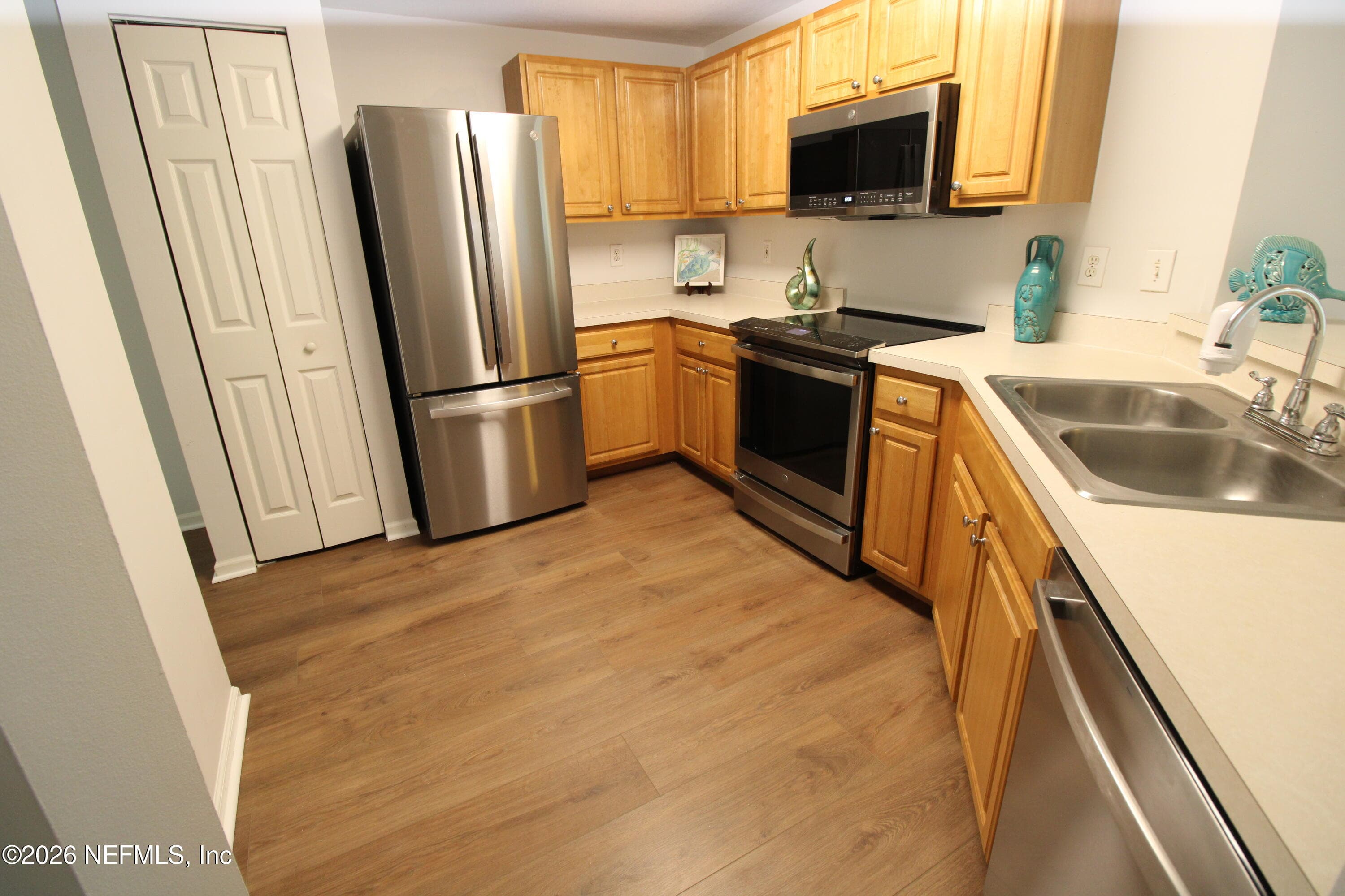 Kitchen with new LVP flooring — 1010 BELLA VISTA Boulevard 126, St. Augustine, FL 32084