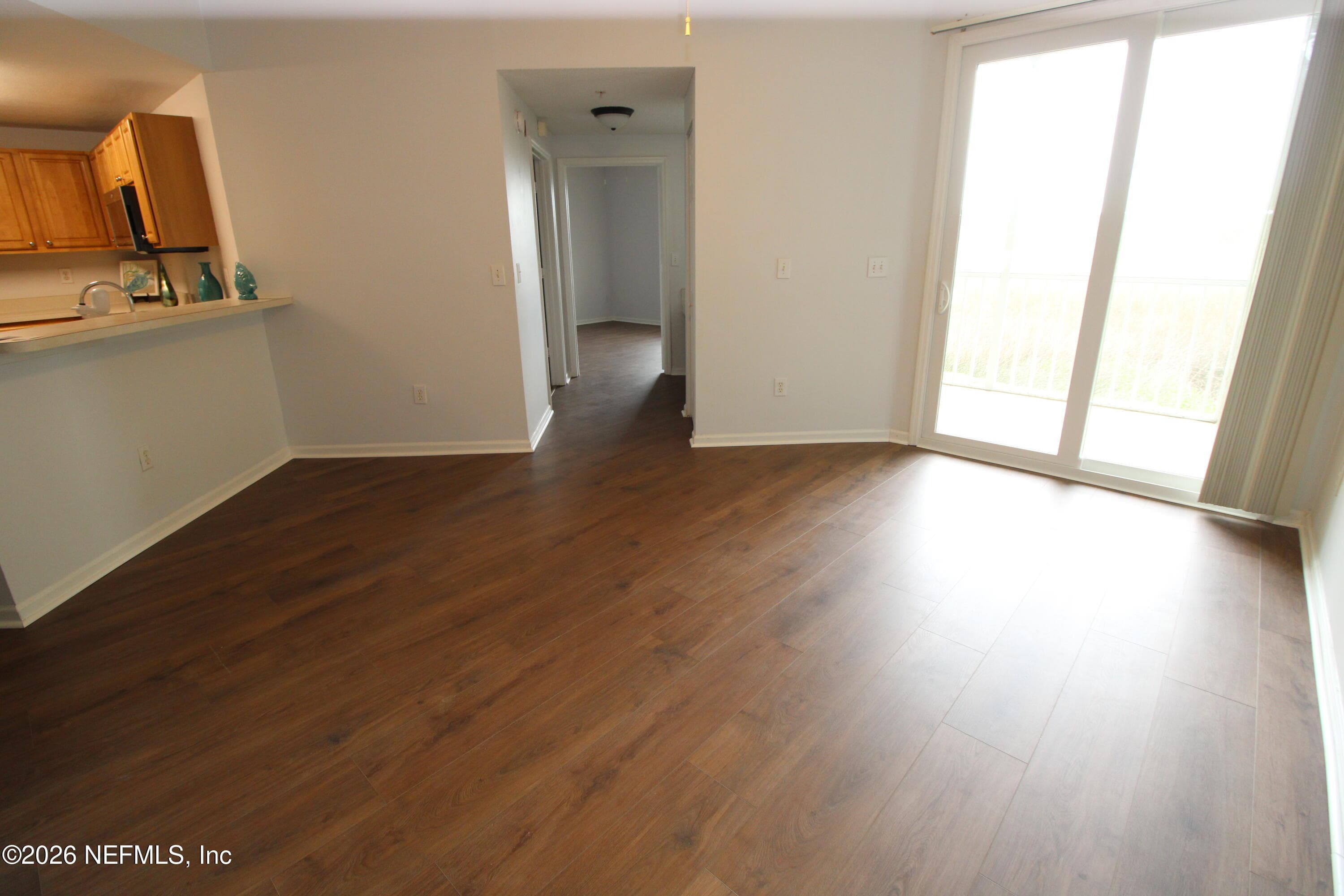 Living room with new LVP flooring — 1010 BELLA VISTA Boulevard 126, St. Augustine, FL 32084