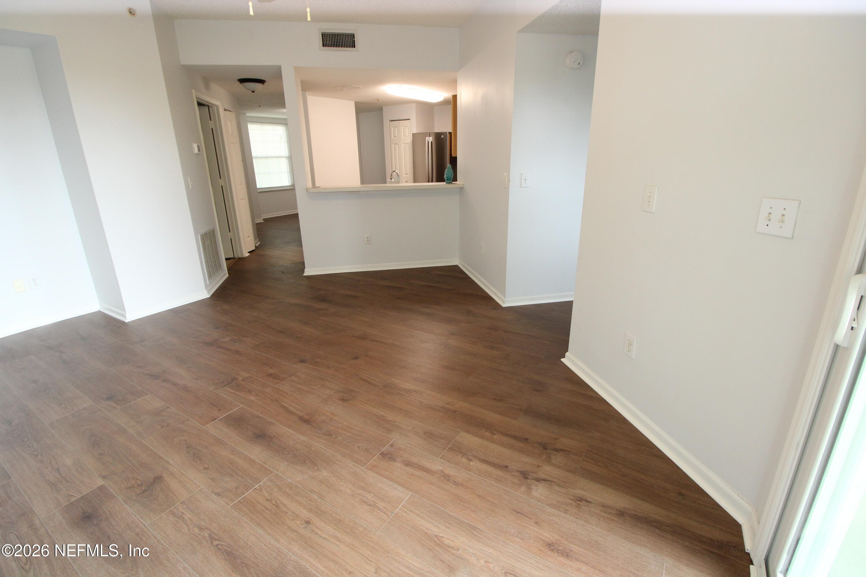 Living roomwith view of breakfast bar — 1010 BELLA VISTA Boulevard 126, St. Augustine, FL 32084