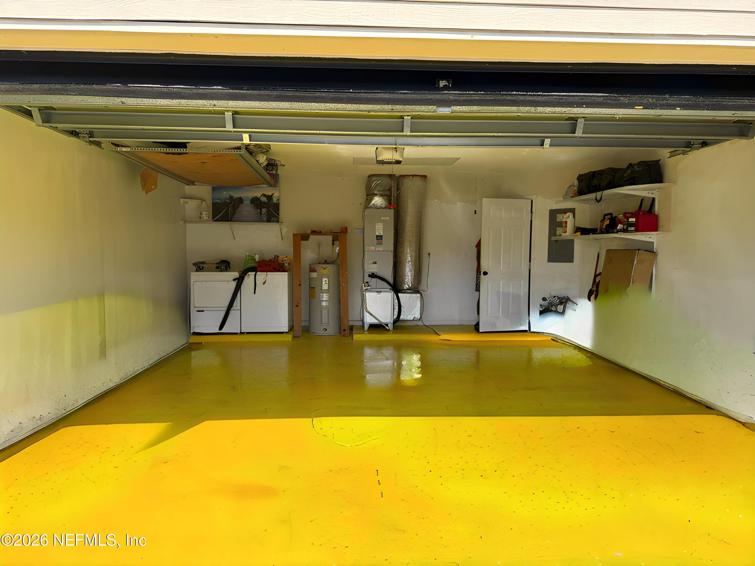 Move in ready down to the details! Love this clean, polished epoxy garage floor — 4362 HANGING MOSS Drive, Orange Park, FL 32073