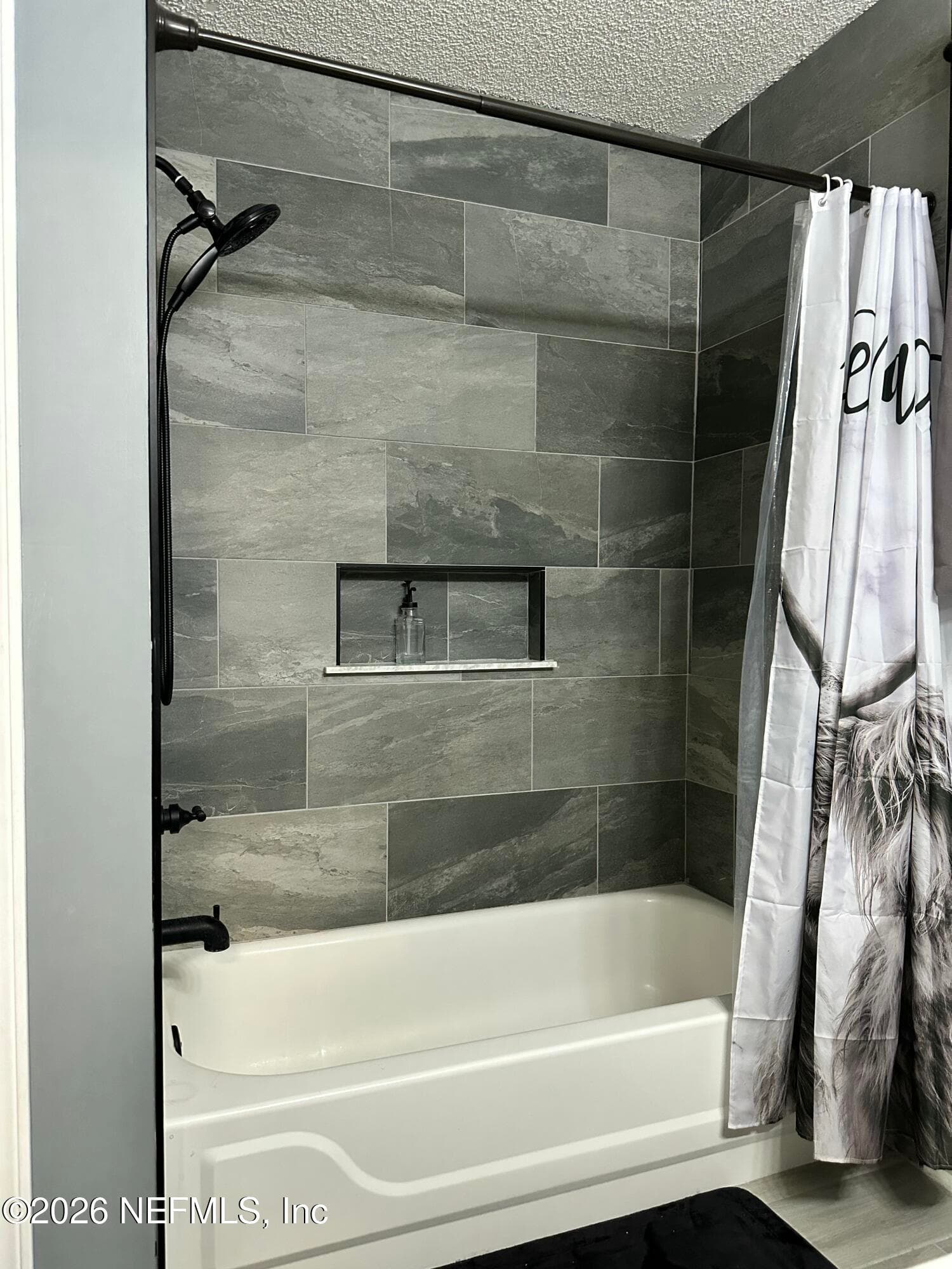 Clean crisp and completely turned key. Love this leak shower tile detail. — 4362 HANGING MOSS Drive, Orange Park, FL 32073