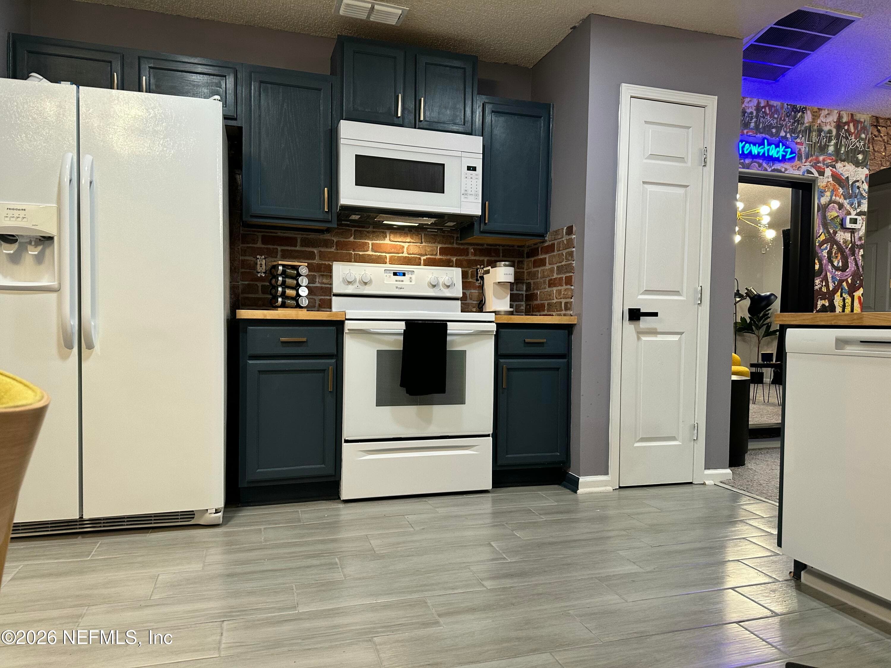Modern cabinetry and butcher block counters — 4362 HANGING MOSS Drive, Orange Park, FL 32073