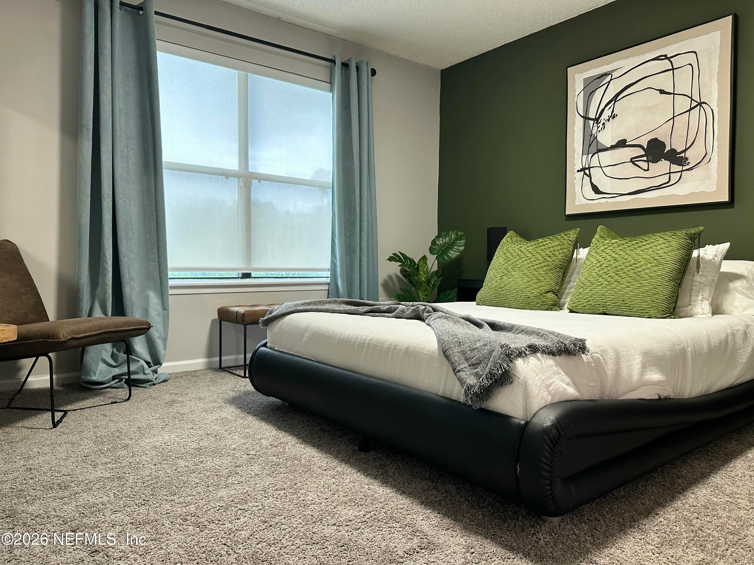 Spacious primary suite with a gorgeous accent wall — 4362 HANGING MOSS Drive, Orange Park, FL 32073