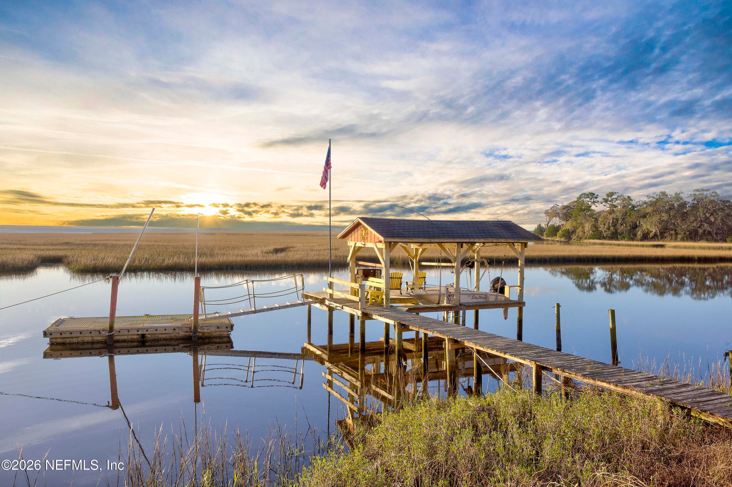 Floating dock is at the — 940564 OLD NASSAUVILLE Road, Fernandina Beach, FL 32034