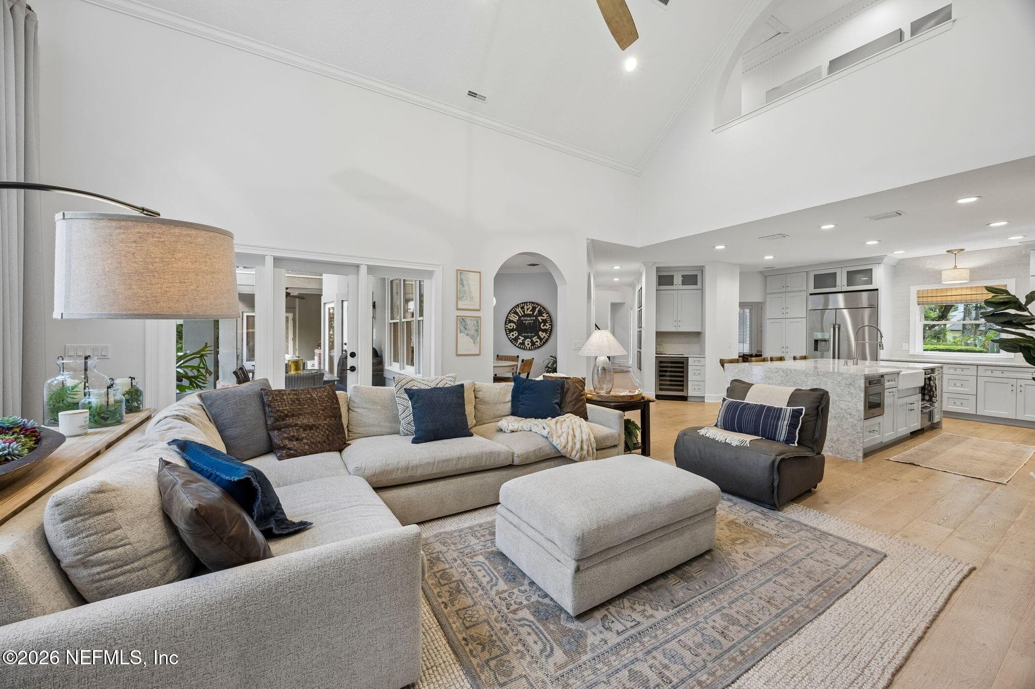 Designed for effortless entertaining, the open-concept living area seamlessly connects spacious seating areas to the gourmet kitchen. — 5070 BENTGRASS Circle, Ponte Vedra Beach, FL 32082