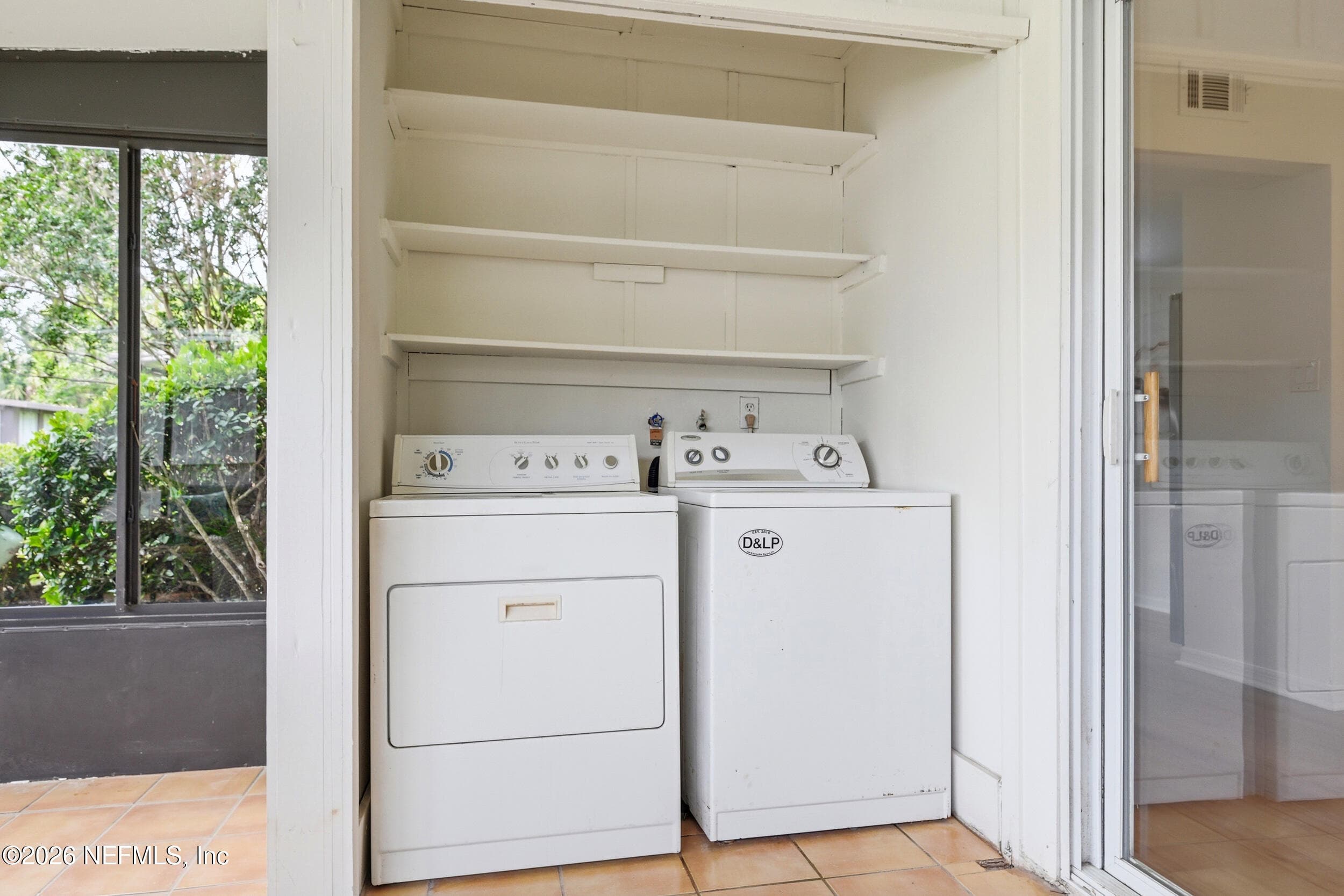 Convenient in-unit washer and dryer are located in the Florida Room, making laundry day a breeze. — 695 N A1A 25, Ponte Vedra Beach, FL 32082