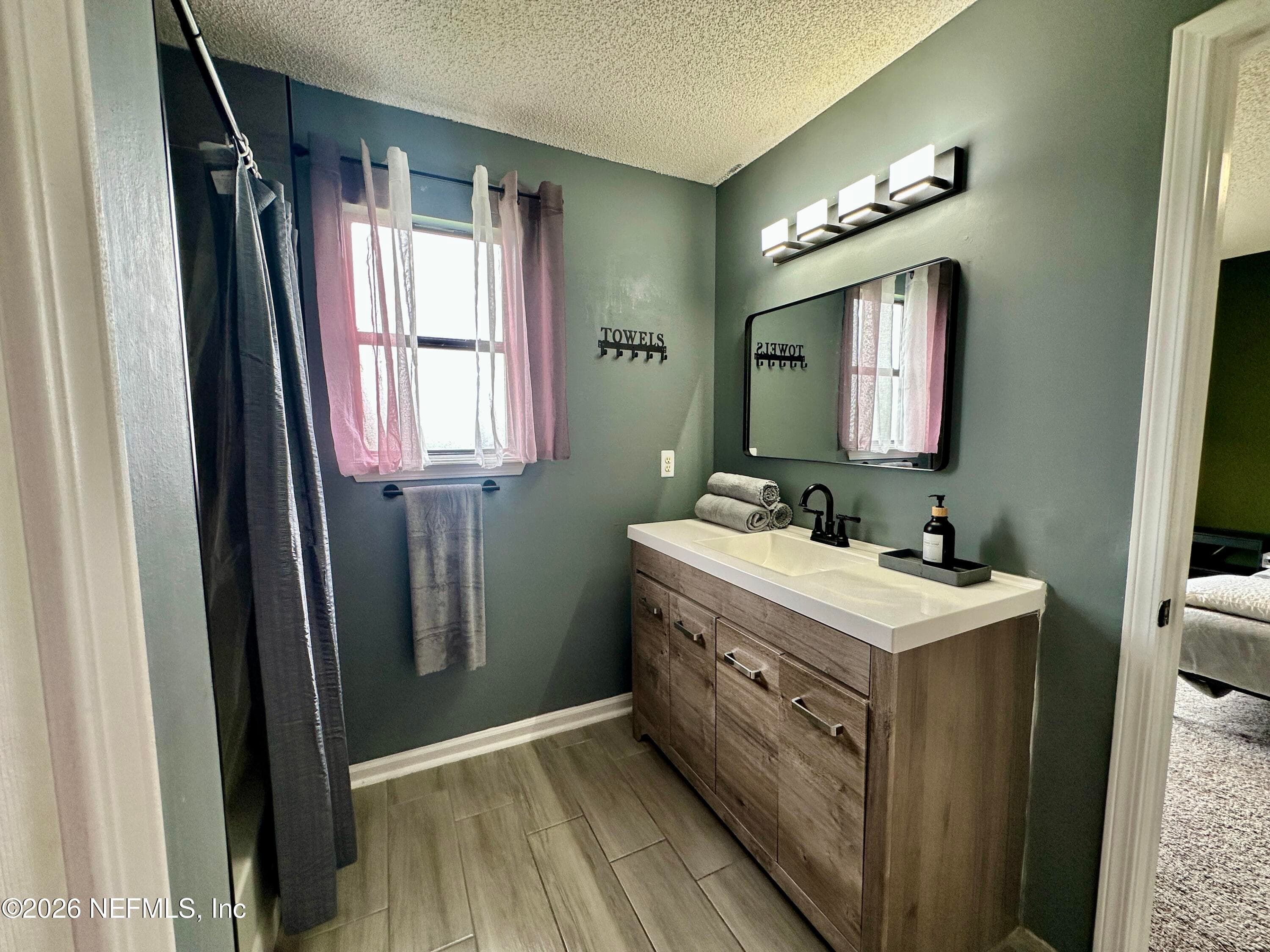 Beautifully updated bathroom fixtures, and stylish finishes — 4362 HANGING MOSS Drive, Orange Park, FL 32073