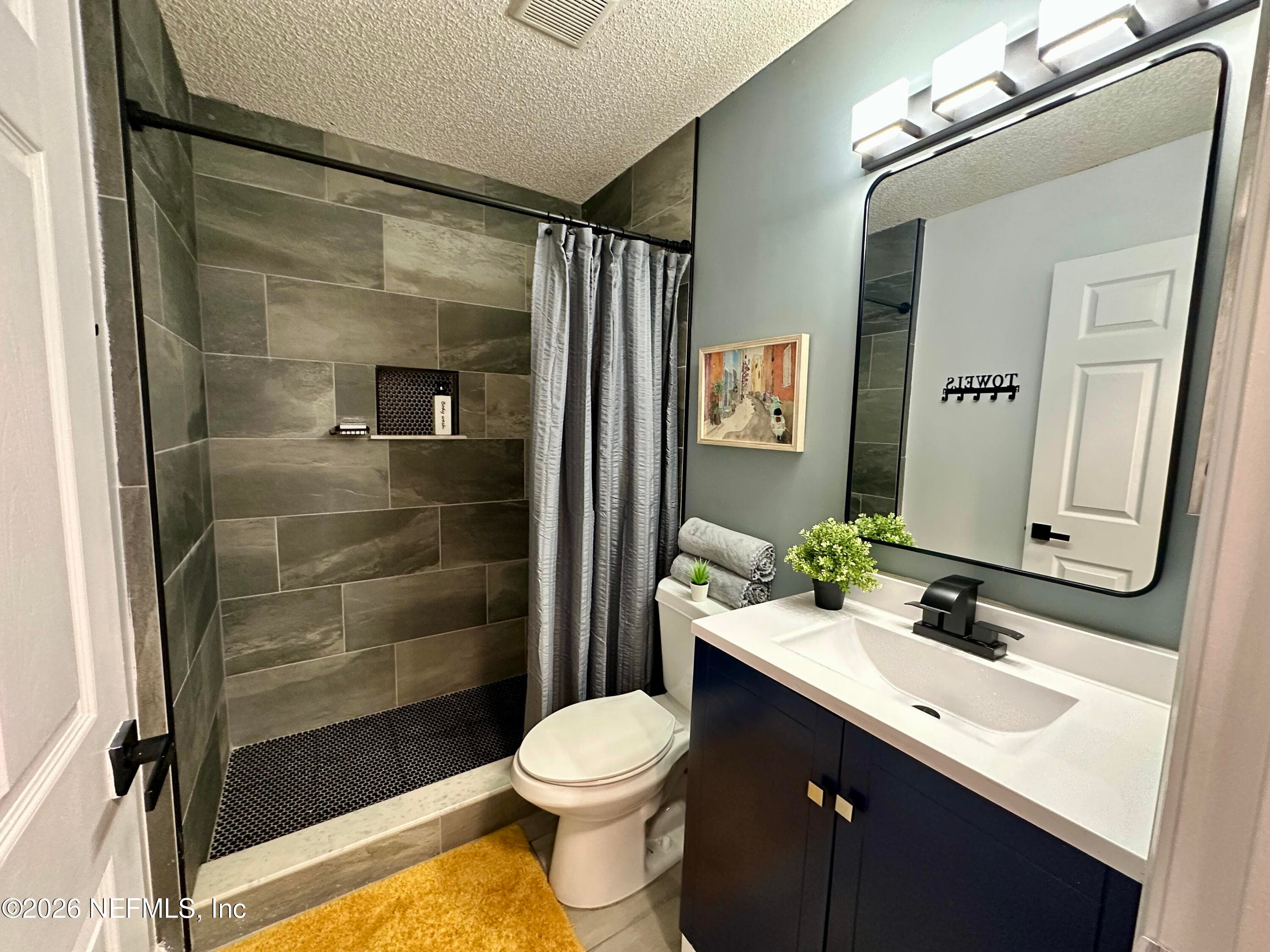 Clean, stylish, secondary full bath with contemporary finishes, and great lighting — 4362 HANGING MOSS Drive, Orange Park, FL 32073