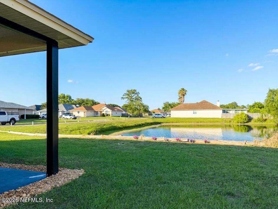 Charming curb, appeal, meets a serene water view — 4362 HANGING MOSS Drive, Orange Park, FL 32073