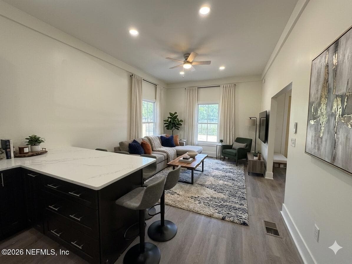 Virtually staged living room — 30 W 12TH Street, Jacksonville, FL 32206