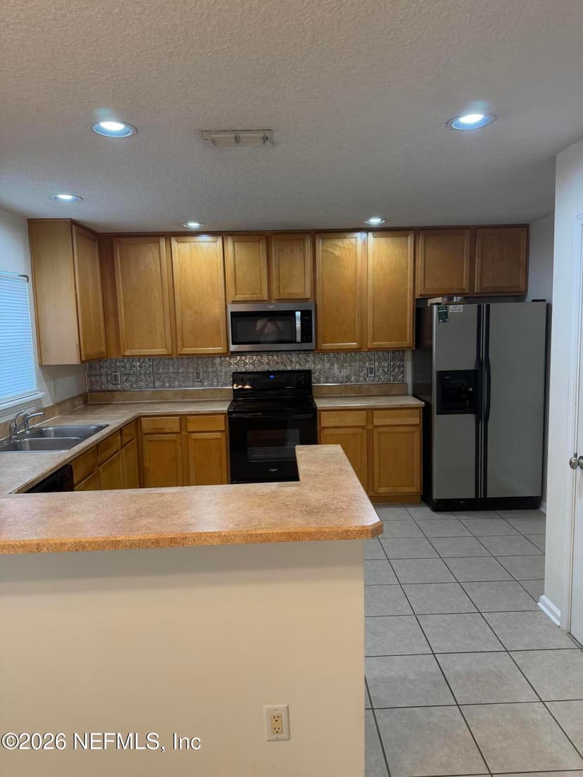 1603 Canopy Oaks Drive, Orange Park, FL 32065